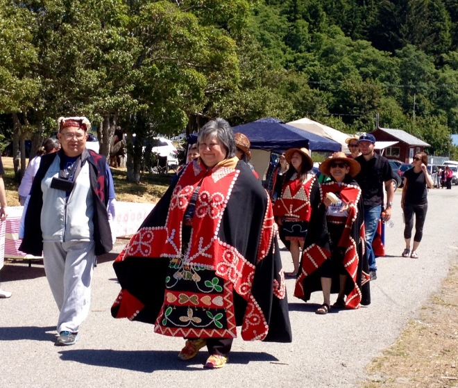 Alert Bay's recently elected Mayor Deborah leads the procession to International Aboriginal Day Celebrations   at the U'mista Cultural Center.